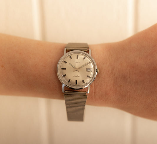 Vintage Silver Sunburst Dial Electric Timex Watch